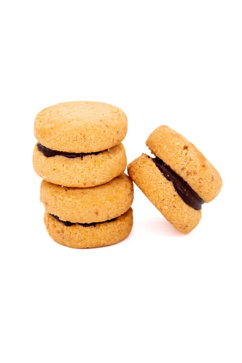 Baci al Rum — Baci di Dama con ganache al rum giamaicano. La frolla alla nocciola piemontese i